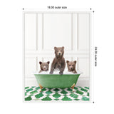 Three brown bear cubs sitting in and around a green clawfoot bathtub filled with bubbles against a white paneled wall and green-and-white patterned floor.