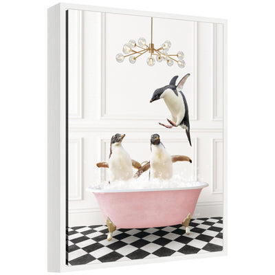 Framed canvas art showing penguins in a pink bathtub on a checker floor by Amy Peterson