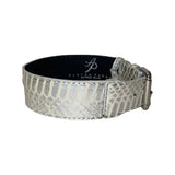 Wide silver snake-patterned collar with classic silver buckle, featuring black inner lining and embossed brand logo inside.