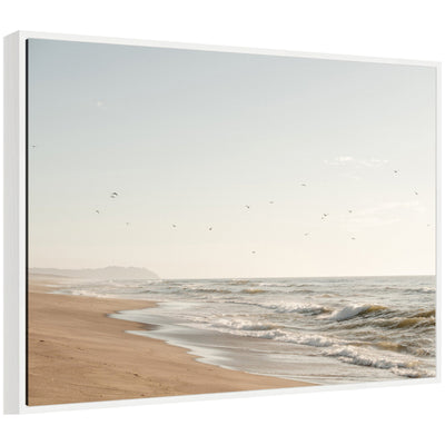 Sylvie Coastal Flight Framed Canvas Beach Artwork by Crystal Lynn Collins showing coastal view with gentle waves