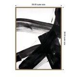 Abstract black brushstrokes crossing diagonally on a white canvas, framed in light wood with outer dimensions 28 by 38 inches.