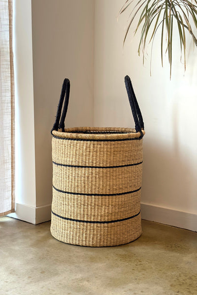 Hold Everything Hamper - Horizontal Black Lines showing woven basket with leather-wrapped handles
