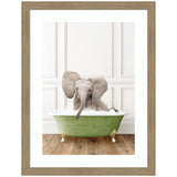 Framed wall art print titled Baby Elephant in Transitional Bathtub by Amy Peterson featuring an elephant in a tub, set in a designer moulding frame
