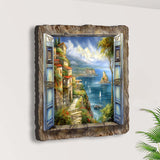 Painting of a coastal village seen through open rustic blue shutters with a rugged stone frame, featuring colorful houses, greenery, sailing boats, and cliffs by the sea under a cloudy sky.