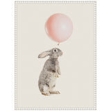 Gray rabbit standing on hind legs holding a large pink balloon string against a cream background with a decorative white frame.