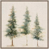 Abstract painting of three evergreen trees in shades of green and brown on a textured neutral linen background within a simple brown wood frame.