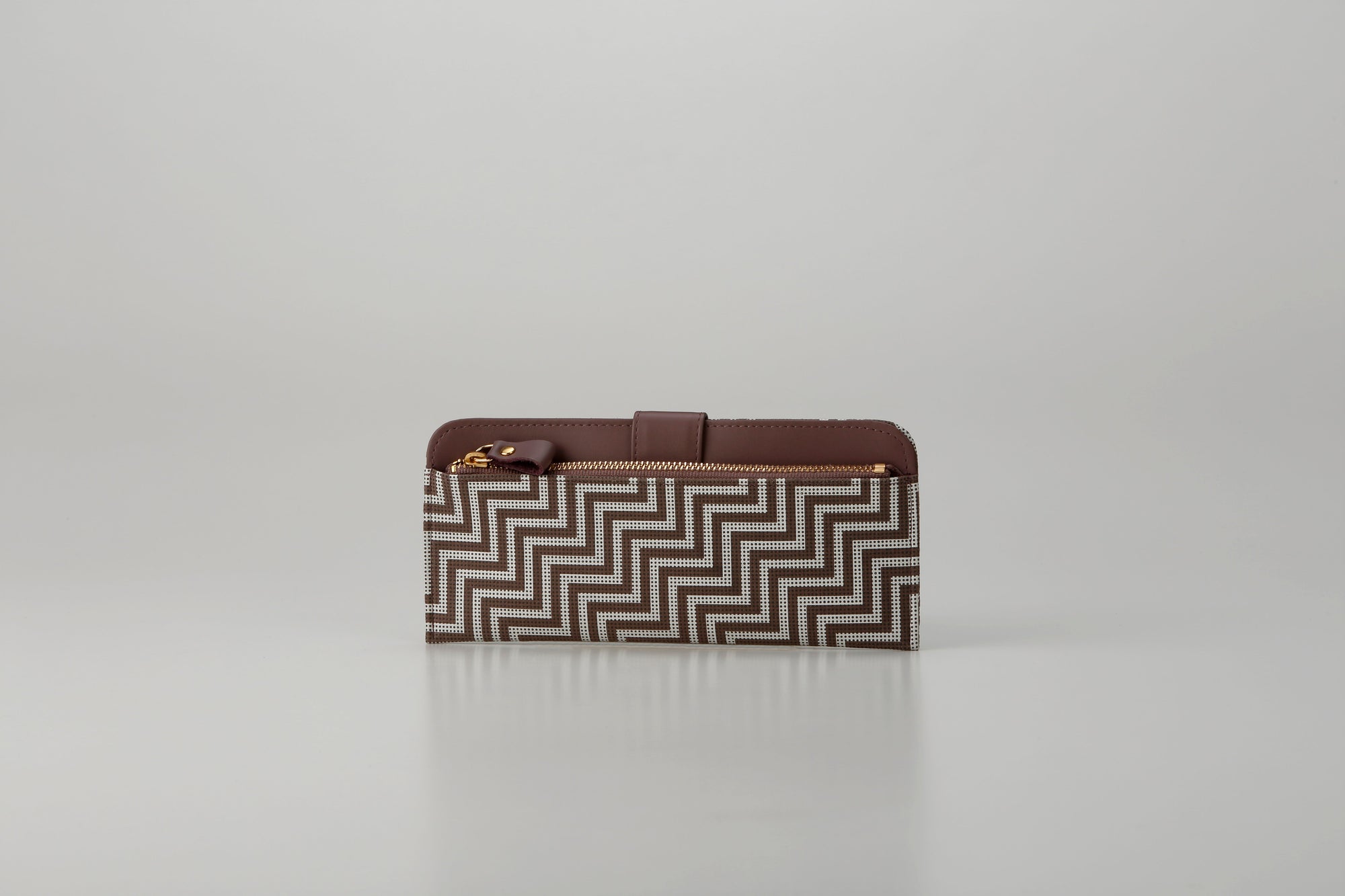 Slim Zipped Long Wallet - New Grecian by Inden showing white hand-drawn pattern on gray leather exterior with zipper detail