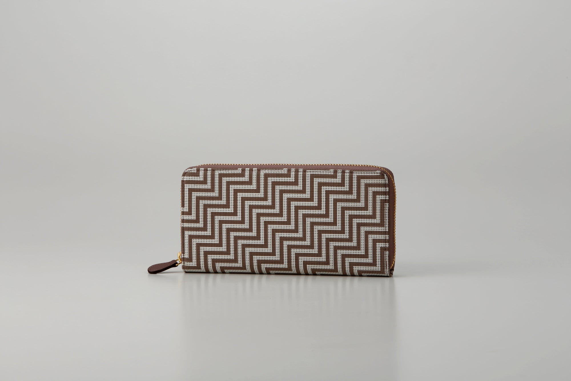 Zipped Long Wallet - New Grecian showing hand-drawn white pattern with gray lacquered dots on deer skin
