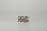 Business Card Case - New Grecian by Inden showing greige deer leather with white hand-drawn pattern and gray lacquer dots