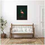 Framed wall art of a pink flamingo standing against a deep green gradient background, centered above a wooden bench with white cushions in a minimalist room.