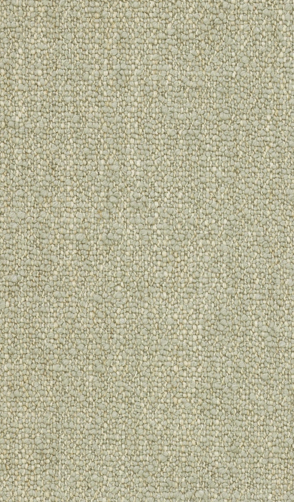 Close-up of a textured boucle fabric in a soft, muted blue tone with a dense, looped yarn pattern creating a plush surface.