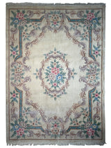 Hand-tufted Chinese Aubusson wool rug with traditional floral motifs in warm earth tones
