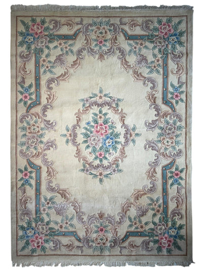Hand-tufted Chinese Aubusson wool rug with traditional floral motifs in warm earth tones