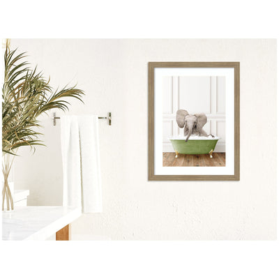 Baby Elephant in Transitional Bathtub by Amy Peterson Framed Wall Art Print