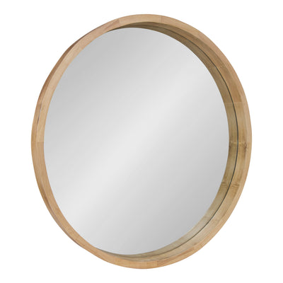 Hutton Round Wood Wall Mirror with natural poplar frame hanging on a wall