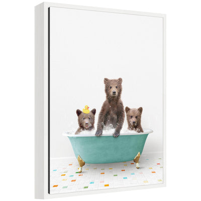 Framed canvas art featuring three bear cubs sitting in a teal bathtub against a colorful tile background