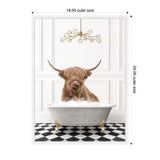 Highland cow with shaggy hair bathing in a vintage white clawfoot tub filled with bubbles, set on black and white checkerboard floor beneath a modern chandelier.