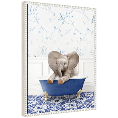 Framed canvas art of a baby elephant with eclectic blue bath colors