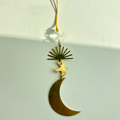 Moon on Their Wings Ornament with Vintage Glass Crystal hanging on wall