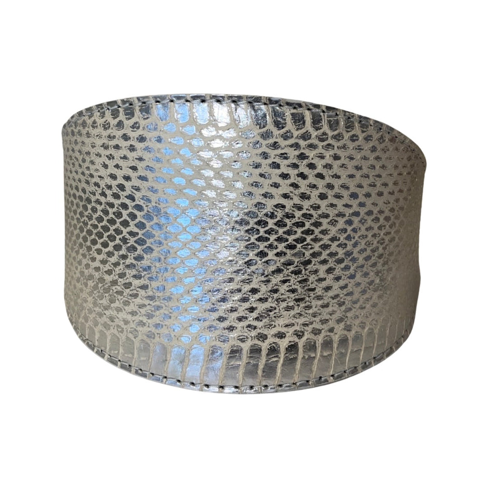 Silver snake-patterned wide collar with glossy, reflective finish and subtle scale texture, shown against a white background.