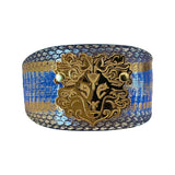 Multi-color snake patterned collar with custom lion head detail displayed on a white background