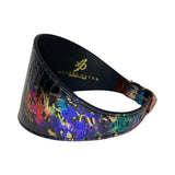 Curved 3-inch wide custom collar with a rainbow-hued snake skin pattern and a gold buckle, featuring a glossy finish against a white background.