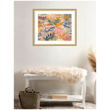 Abstract floral painting with layered leaves and petals in soft pinks, greens, blues, and oranges, framed in light wood and hung above a white bench with a fur throw.