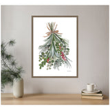 Framed watercolor painting of a holiday swag with mixed green pine branches, eucalyptus, red berries, and a brown bow on a white background, hanging above a wood shelf.