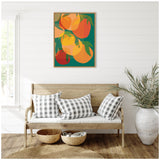 Framed abstract wall art of overlapping orange and yellow citrus fruits with green leaves on turquoise background, above a wooden bench with three gray-and-white plaid pillows.
