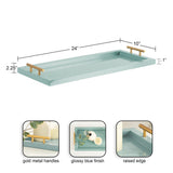 Rectangular light blue tray with raised edges and gold metal handles on the shorter sides, measuring 24 by 10 inches with a 1-inch depth.