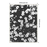 Black and white photograph of numerous chamomile flowers densely grouped, framed with white beaded trim, showing outer dimensions labeled 28 by 38 inches.