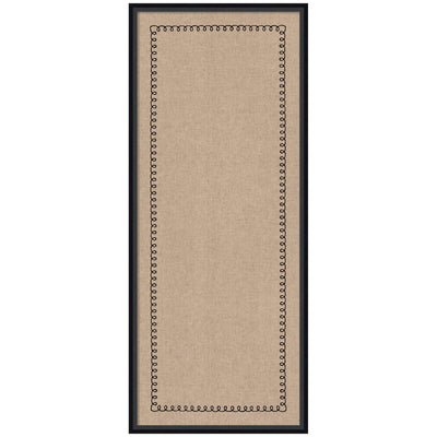 Pinboard with neutral linen fabric and black scallop border displayed on a wall