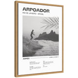 Framed canvas wall art of Rio de Janeiro coastal scene with surfer silhouette and palm frond shadows