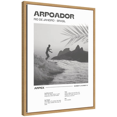 Framed canvas wall art of Rio de Janeiro coastal scene with surfer silhouette and palm frond shadows