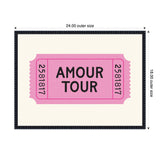 Pink retro-style ticket with black text 'AMOUR TOUR' centered, framed in black with a cream background, showing ticket numbers 2581817 on each side.