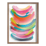 Vibrant abstract painting featuring layered brushstrokes in pink, orange, green, blue, and yellow with white dotted accents, framed in light wood.