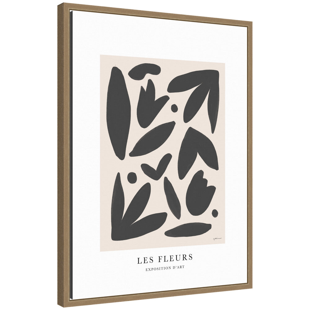 Exposition d Art Les Fleurs framed canvas wall art print styled on a white wall above vintage chair with a woven seat