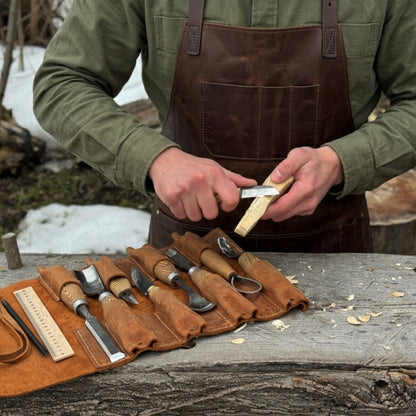 Handmade 8 pocket leather tool roll by Sharky Forged Steel Tools, open with tools inside
