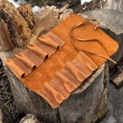 Handmade 8 pocket leather tool roll by Sharky Forged Steel Tools, open with tools inside