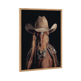 Portrait of a brown horse wearing a light tan cowboy hat and Western saddle, set against a black background and framed in natural wood.