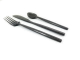 Vibhsa Stainless Steel Flatware 18-piece set including knives, forks, and teaspoons arranged on a neutral surface