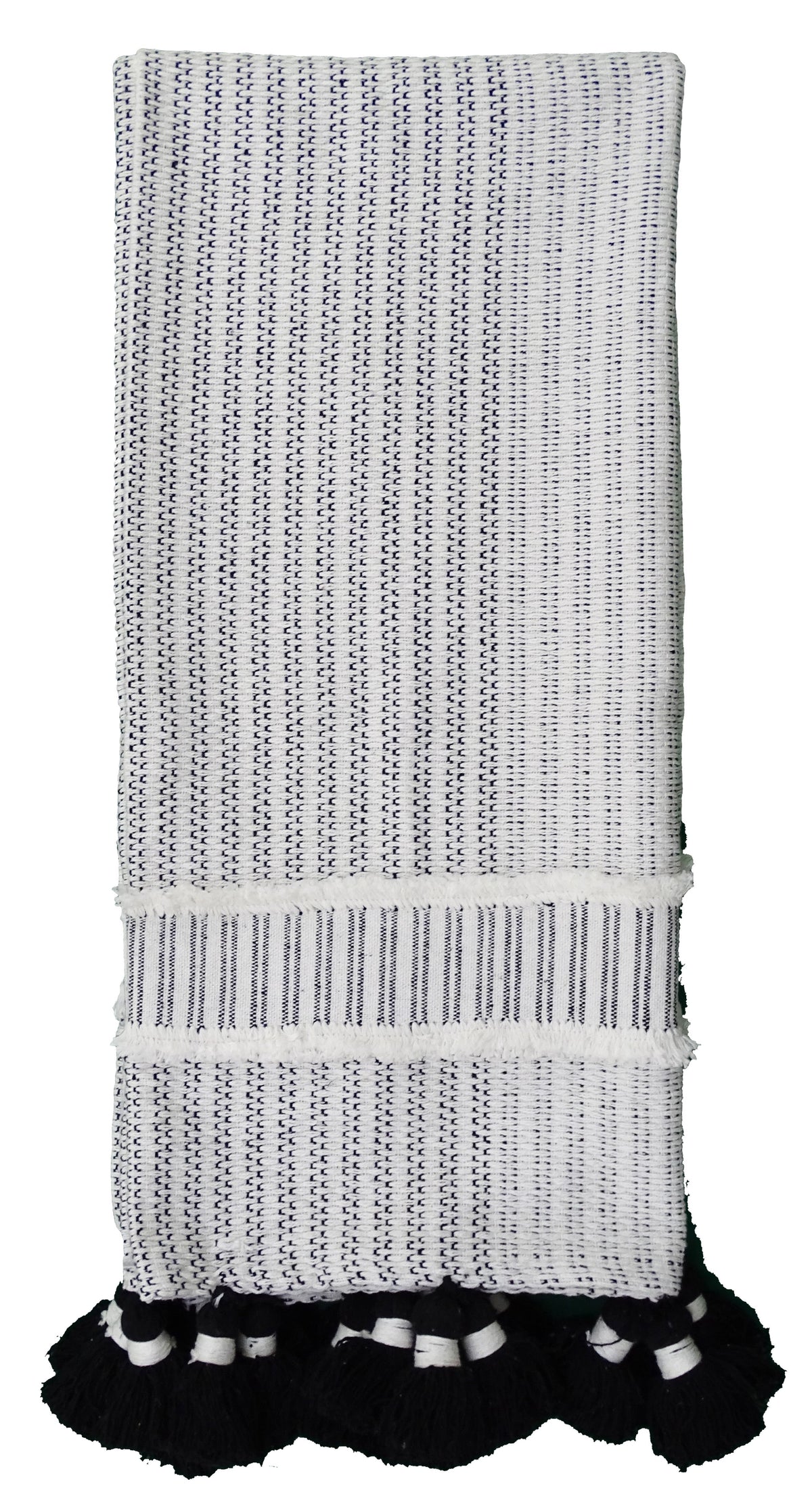 Handwoven textured throw in black and off-white featuring vertical stripe patterns and thick black and white tassels on one end, displayed folded.