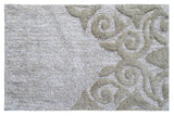 Beige and ivory rectangular bath rug with damask pattern