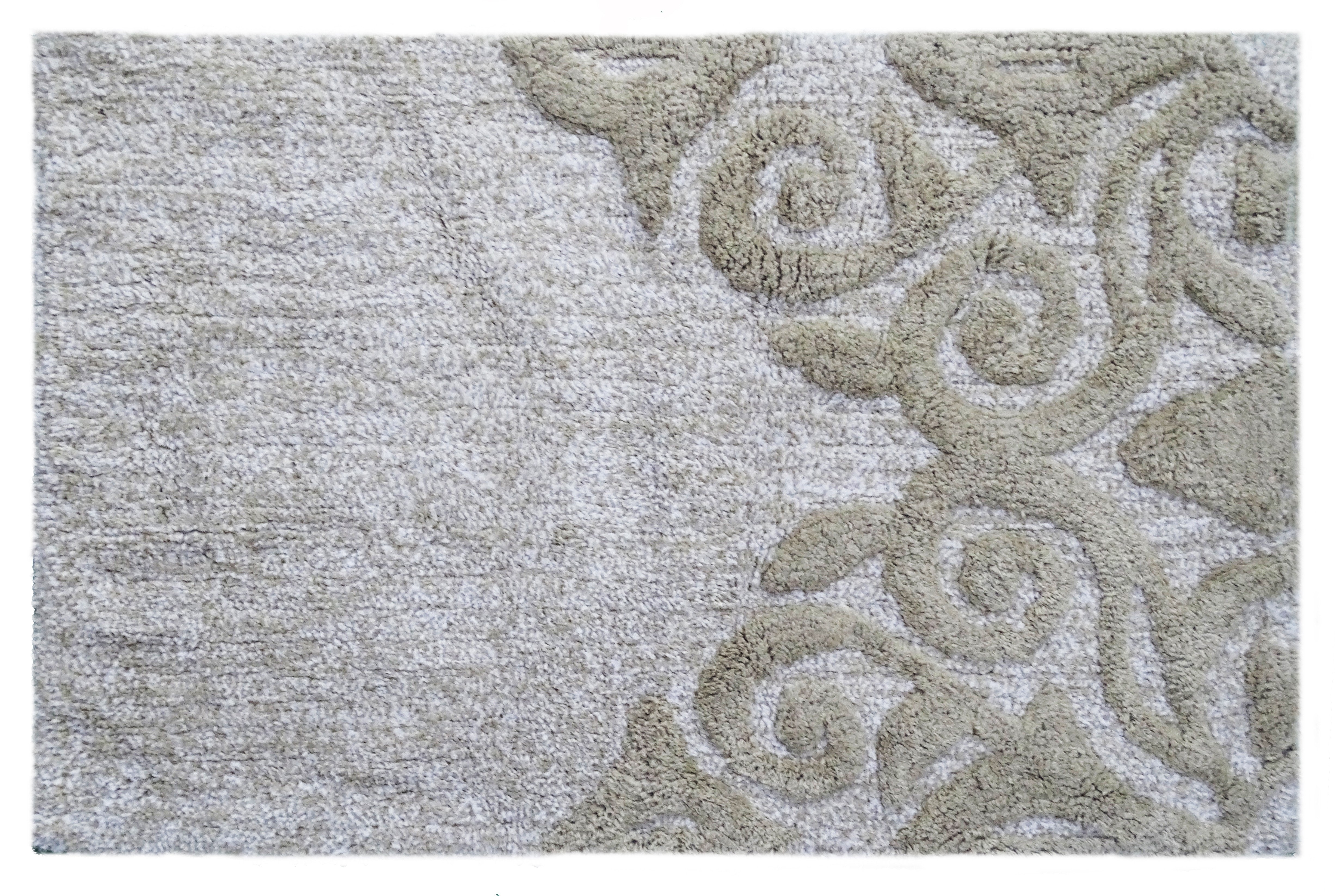Beige and ivory rectangular bath rug with damask pattern