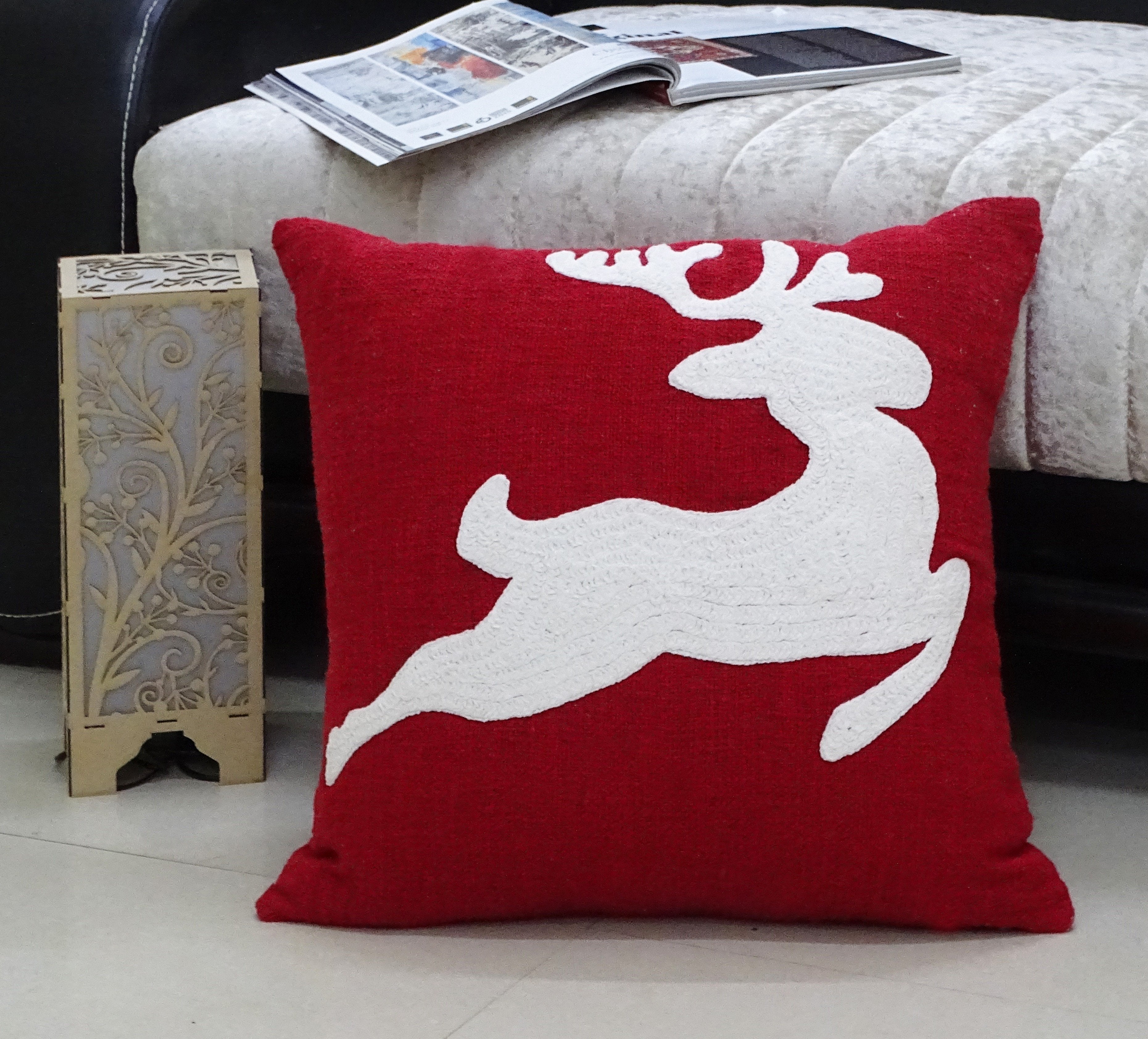 Christmas Decorative Throw Pillow with embroidered reindeer on sofa, front and back views