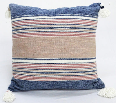 22 by 22 inch throw pillow with striped chenille texture and tassels on corners on a couch
