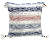 Multicolor textured woven throw pillow with tassels on sofa