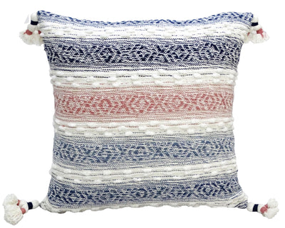 Multicolor textured woven throw pillow with tassels on sofa