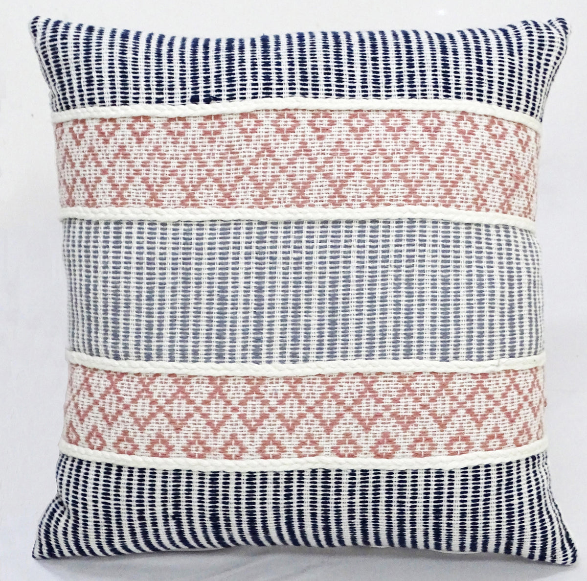 22" X 22" Decorative Throw Pillow featuring black vertical stripes with braided detailing and tassels on a couch