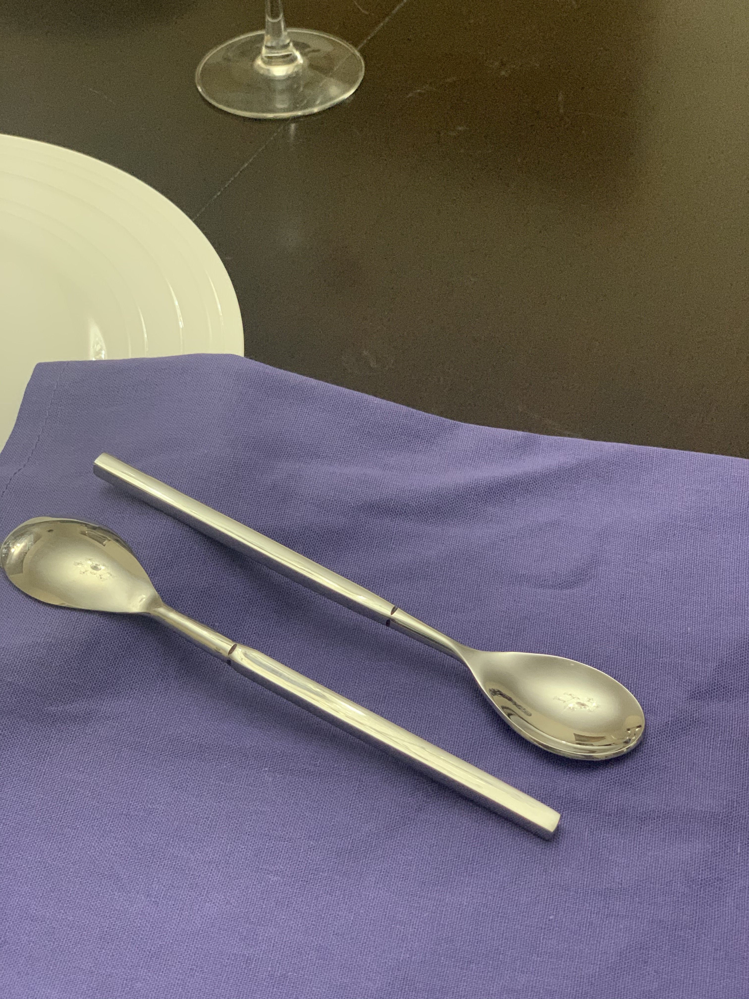 Vibhsa 6-PC Stainless Steel Dinner Spoons arranged on a gray fabric surface